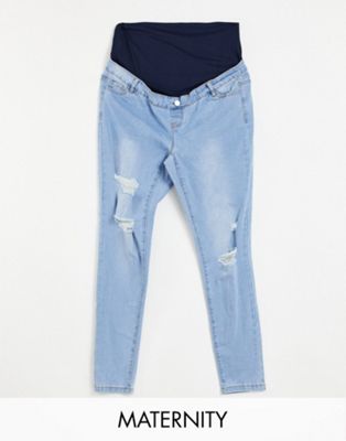Missguided Maternity Sinner over the bump jeans with rips in midwash blue - ASOS Price Checker