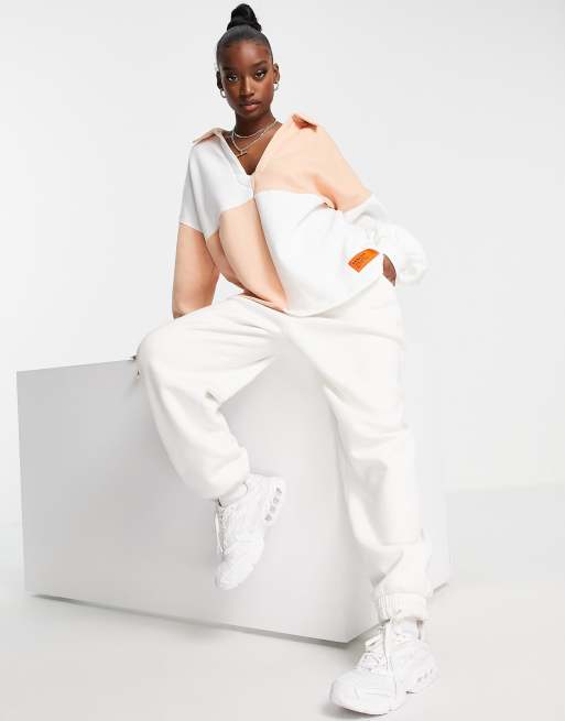 Missguided - Oversized rugby sweatshirt in perzikkleurig dambordpatroon