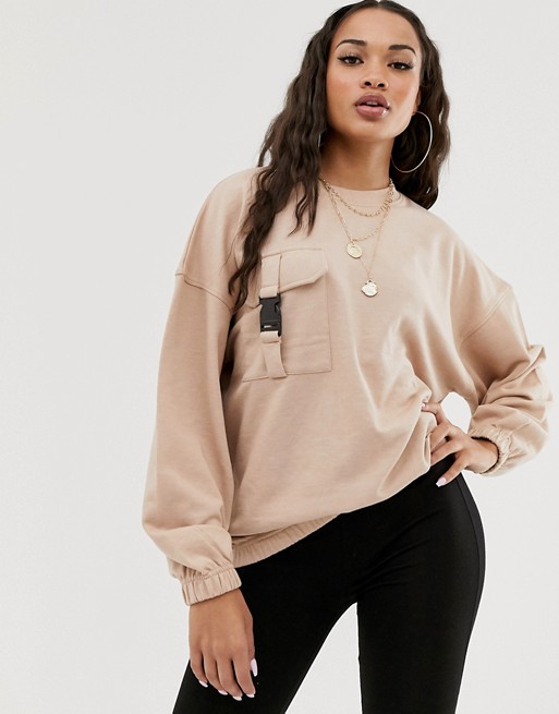 Missguided oversized sweatshirt with buckle pocket in pink