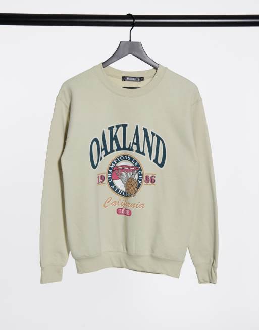 Missguided oversized sweatshirt with oakland graphic in stone