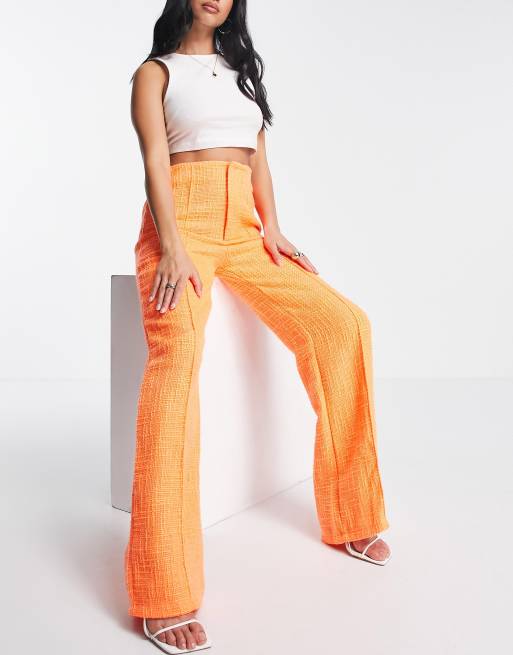 Neon orange hot sale trousers