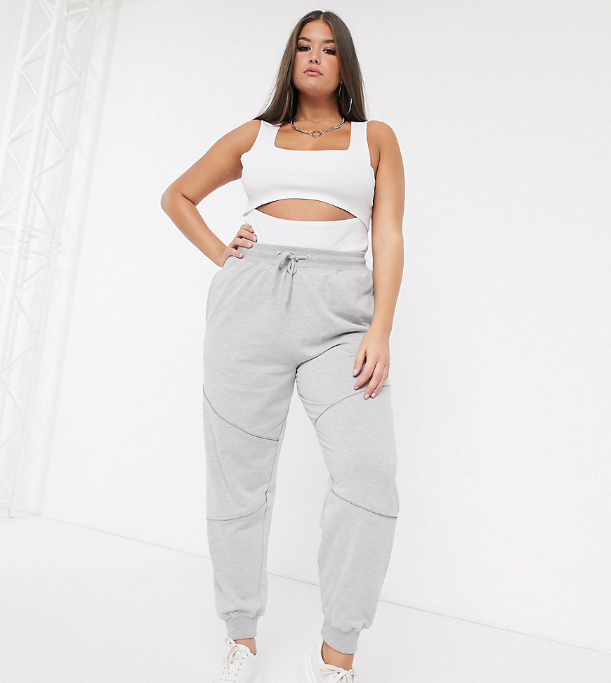 Plus-size sweatpants by Missguided Throw on and go High rise Drawstring waistband Side pockets Reflective detailing Fitted cuffs Regular fit True to size
