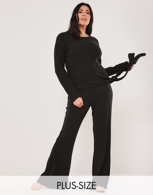 Missguided Plus flare pants in black