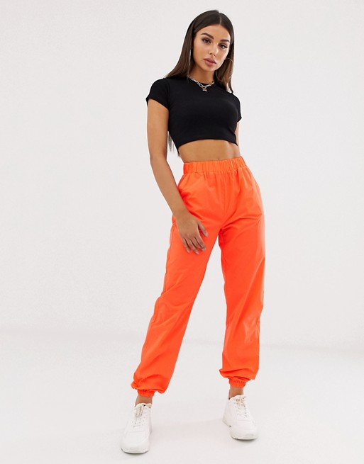 Missguided reflective cargo trousers in orange