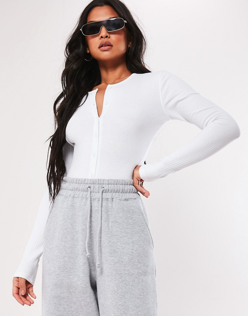 Missguided ribbed button-front bodysuit with long sleeve in white
