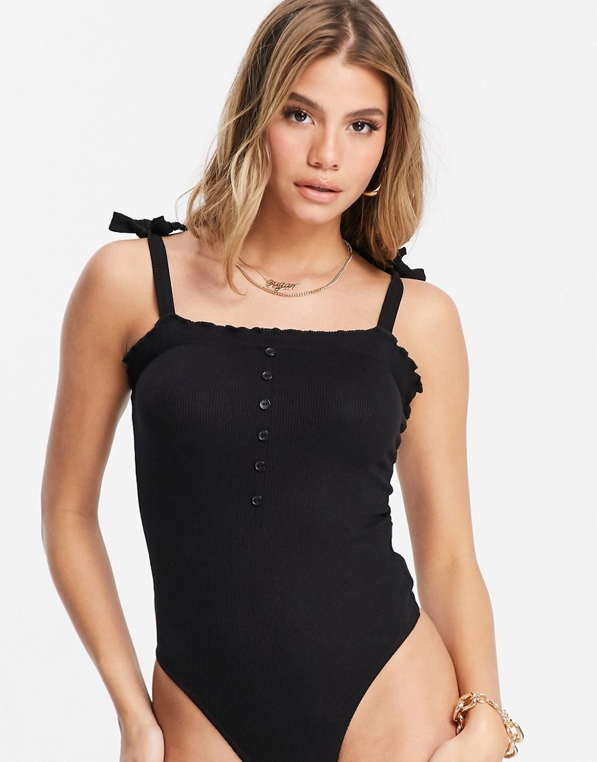 Missguided ribbed lettuce edge bodysuit with tie straps in black