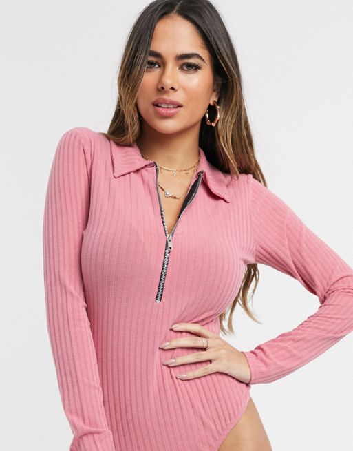 The Pink Zip-Up Bodysuit You Need In Your Closet