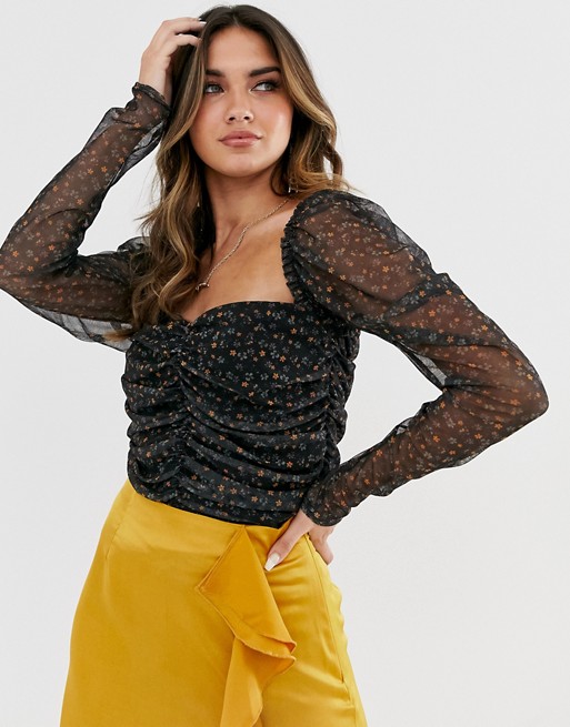 Missguided ruched mesh milkmaid top with puff sleeves in black ditsy floral