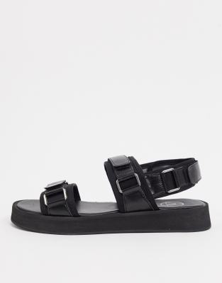black buckle sandals