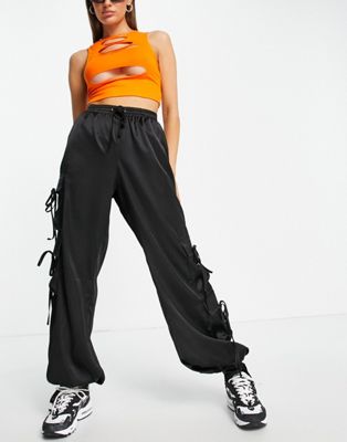 Missguided satin cargo trousers with tie cuff detail in black
