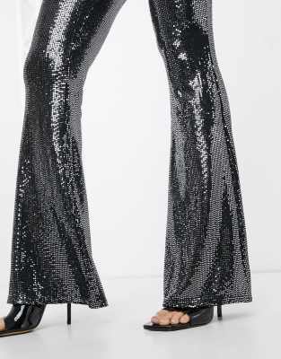 black sequin flared trousers