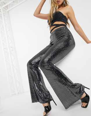 black sequin flared trousers