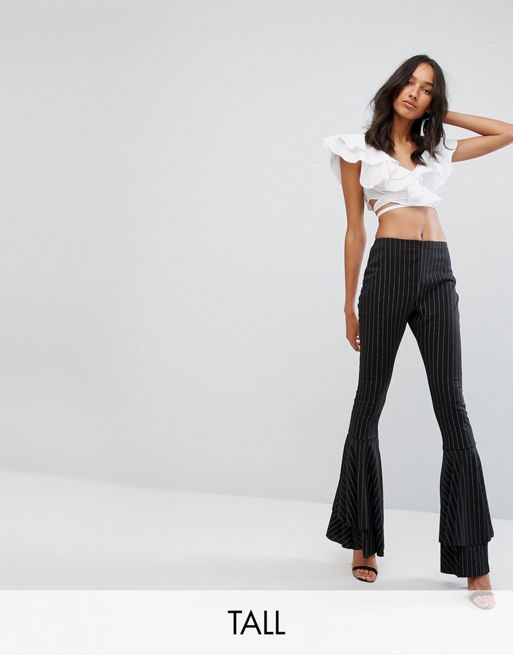 Lioness low rise tailored contrast waistband pants in black