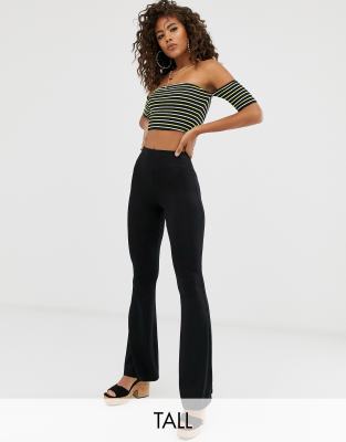tall black flared trousers