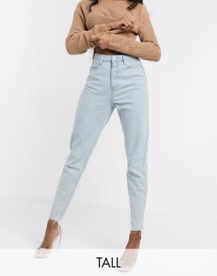 Missguided Tall mom jeans with raw hem in light wash blue-Blues