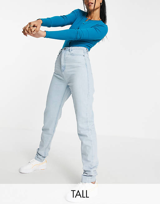 Missguided Tall Riot high waist mom jean with raw hem in lightwash blue