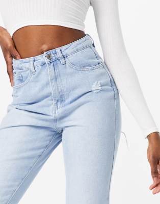 light blue riot highwaisted distressed knee mom jeans