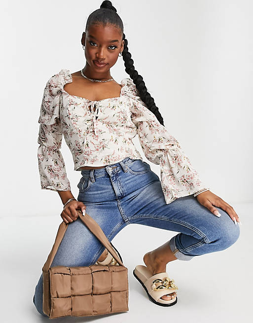 Missguided tie neck blouse with frill shoulder in cream floral
