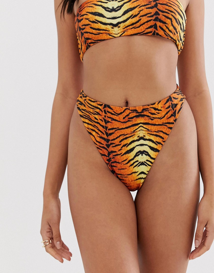 Missguided – Tigermönstrad bikiniunderdel med högt skurna ben i vändbar modell-Flerfärgad