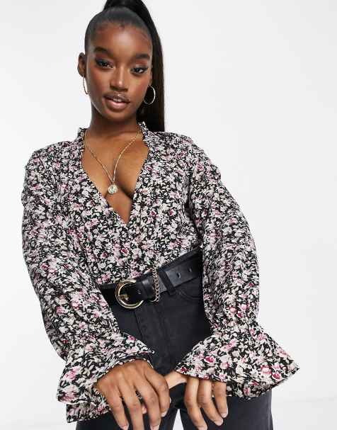 Free People floral print bodysuit in black