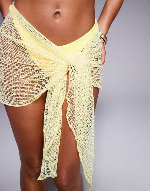 Missy Empire – Kurzer Strand-Sarong aus weitmaschigem Strukturstrick in Gelb, 5 von 5