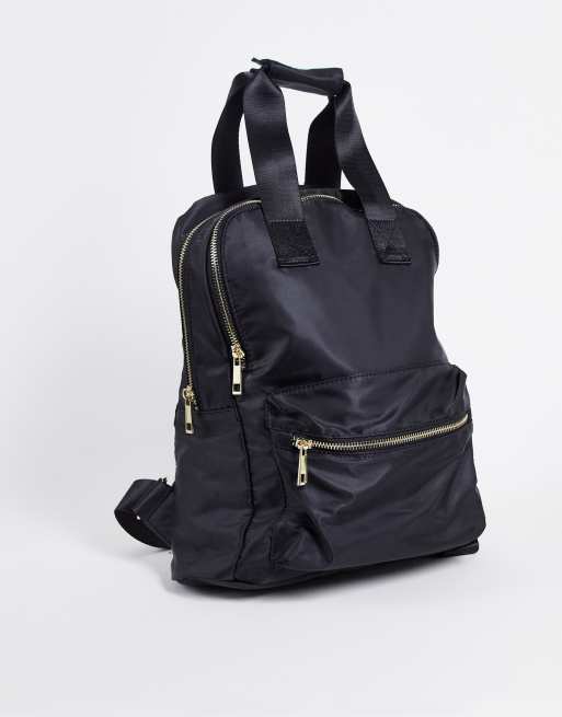 Mochila negra con múltiples bolsillos y compartimento para portátil de nailon reciclado de ASOS DESIGN