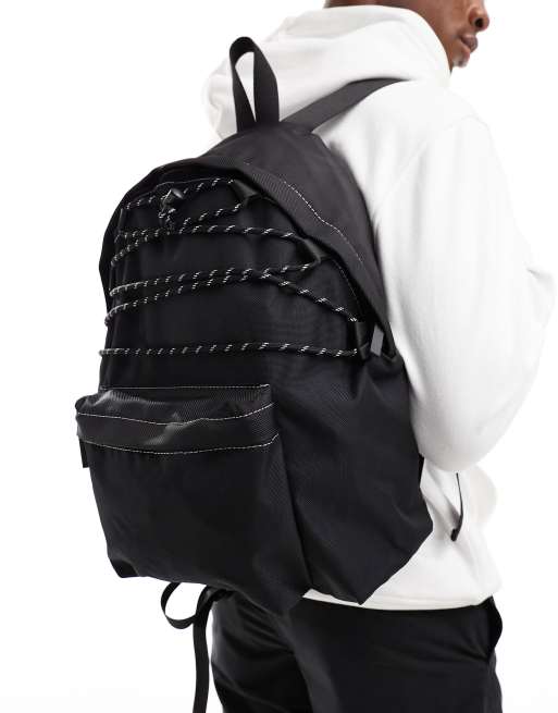 Mochila negra de lona con base de cuero sintético de ASOS DESIGN