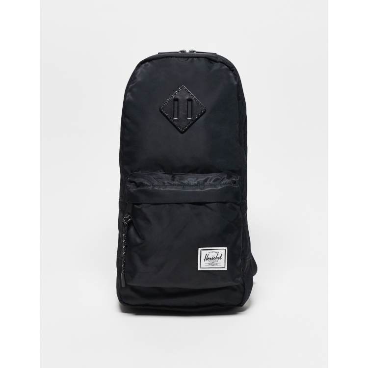 Mochila negra estilo bandolera de nailon Heritage de Herschel Supply Co RcjShops