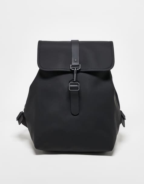 Mochila negra de lona con base de cuero sintético de ASOS DESIGN