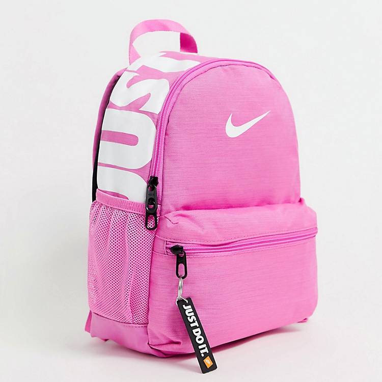 estudiante universitario Centro de producción Dureza Mochila pequeña en rosa Just Do It de Nike | ASOS