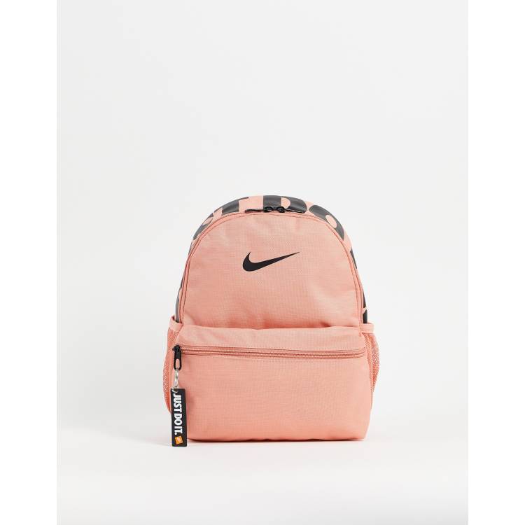 Empresa enaguas Cardenal Mochila pequeña rosa negruzco Just Do It de Nike | ASOS