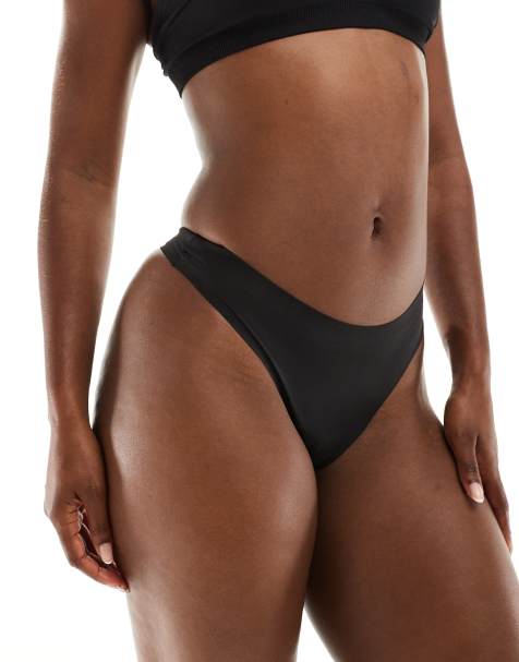 Modibodi Seamfree light absorbency period thong in black - view 1
