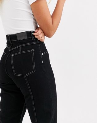 black jeans with white stitching