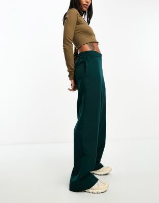 Monki high pull-on flare trousers in dark green - ASOS Price Checker