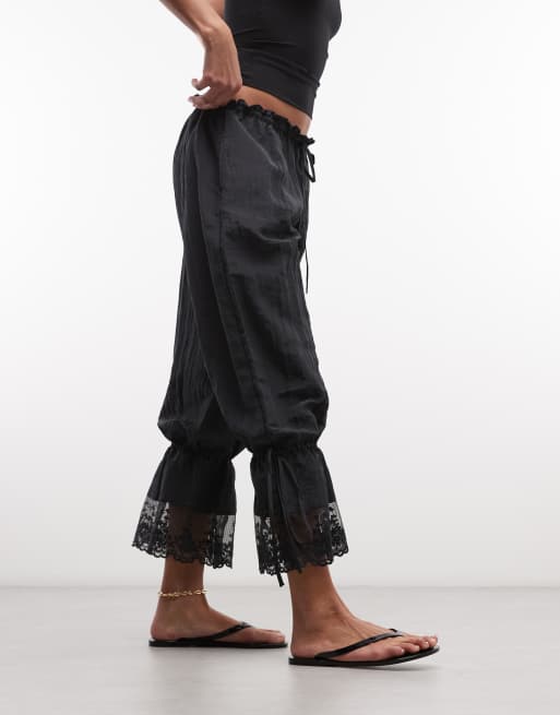 Monki – Białe fakturowane spodnie z balonowymi nogawkami i koronką, 2 z 5