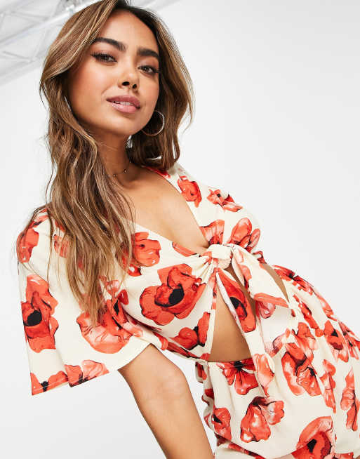 Monki – Blommig, avslappnad playsuit med knytning framtill och volangärmar, 4 av 4