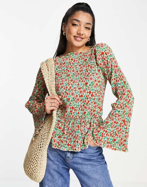 Monki – Blommig långärmad topp i oversize med peplum-modell 