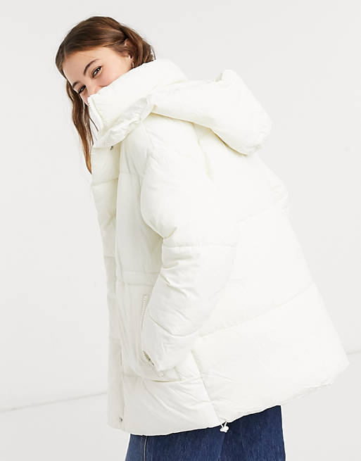 Coats & Jackets Monki Bora recycled padded short jacket in off white 