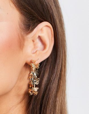 Monki butterfly hoop earrings in gold