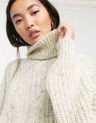 white knitted roll neck jumper