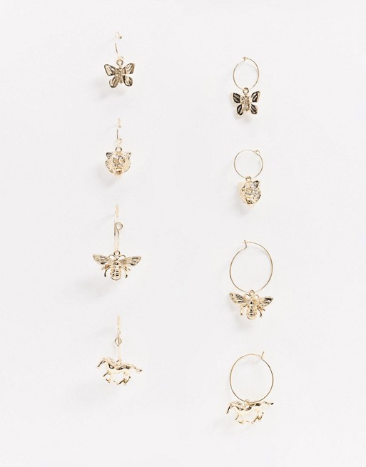 Monki Charmaine butterfly hoop earrings in gold
