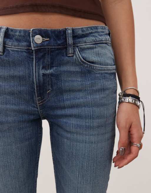 Monki Cheri low waist wide flare jeans with pockets in mid blue wash, 5 of 5