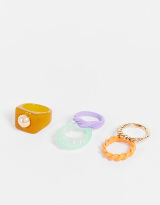 Monki 4 pack plastic rings in multi