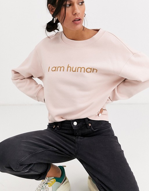 Monki classic round neck slogan sweatshirt in pink