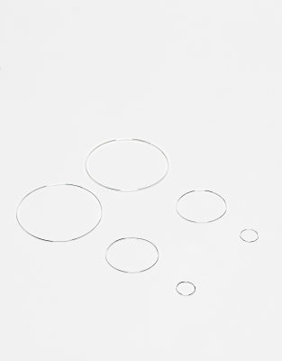 Monki - Confezione da 3 paia di orecchini a cerchio grandi color argento