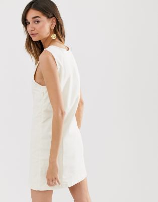 white sleeveless shift dress