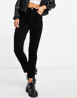 black skinny cord trousers