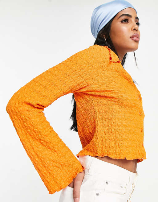 https://images.asos-media.com/products/monki-crinkle-shirt-with-long-sleeve-in-orange/202669618-1-orange?$n_640w$&wid=513&fit=constrain