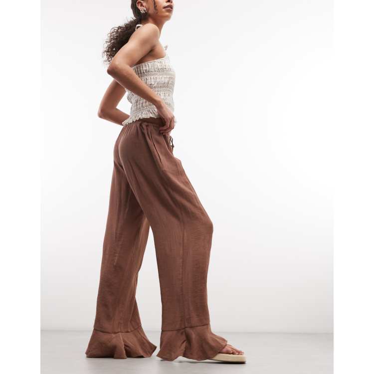 Monki crinkle wide leg pants in brown | ASOS