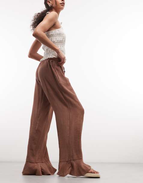 Monki crinkle wide leg trousers in brown - view 1
